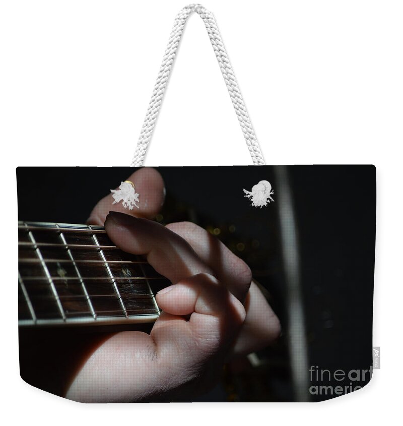 Musician Weekender Tote Bag featuring the photograph Catching The Light by Alys Caviness-Gober