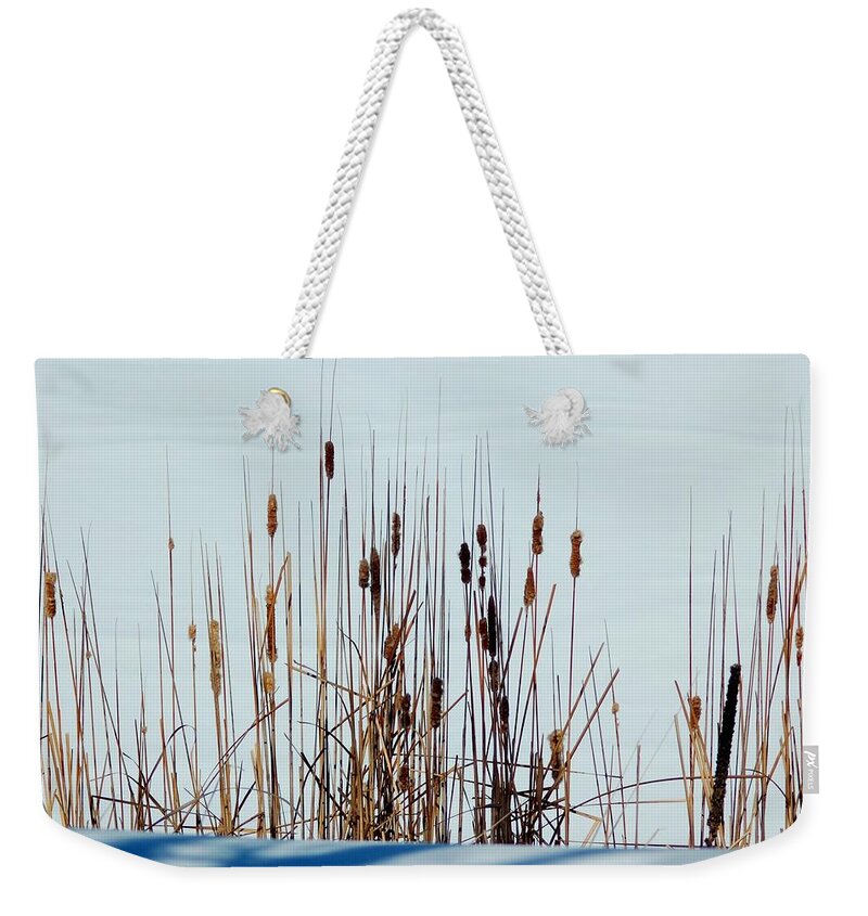 Dakota Weekender Tote Bag featuring the photograph Cattails in Snow by Greni Graph