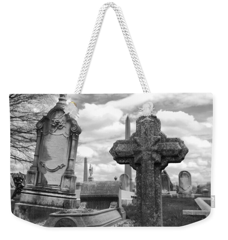 Cemetery Weekender Tote Bag featuring the photograph Cemetery graves by Jennifer Ancker