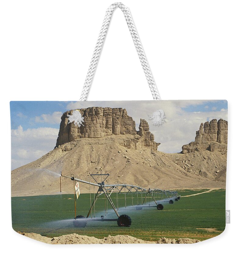 Agricultural Weekender Tote Bag featuring the photograph Center-pivot Irrigation, Saudi Arabia by Ray Ellis