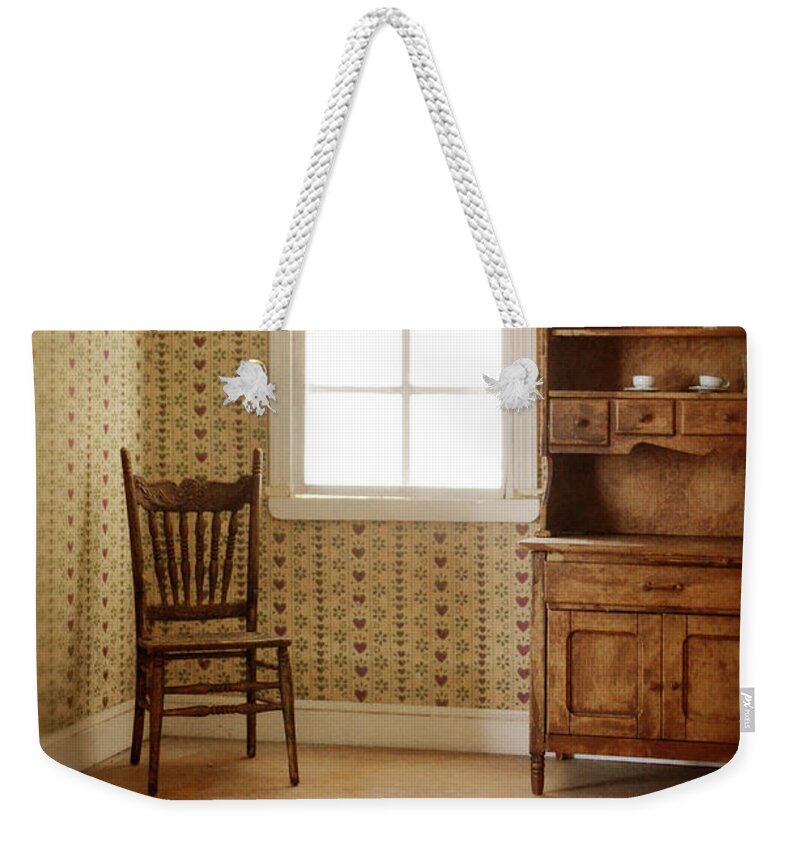 Dollhouse Weekender Tote Bag featuring the photograph Chair and Cupboard by Jill Battaglia