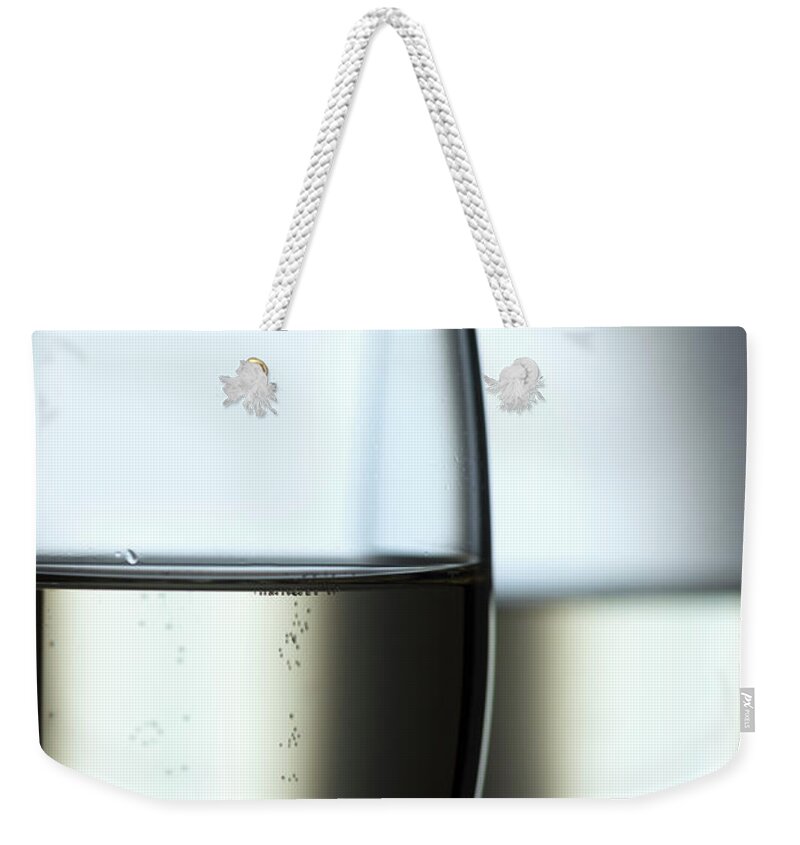 Alcohol Weekender Tote Bag featuring the photograph Champagne, Sekt by Kontrast-fotodesign