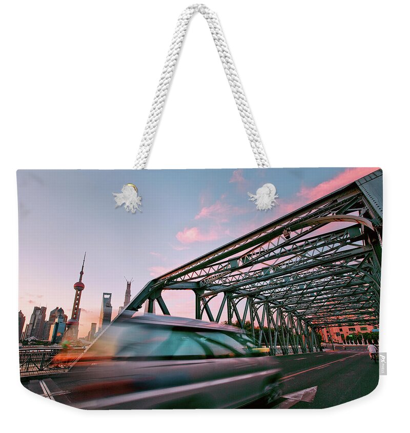 People Weekender Tote Bag featuring the photograph Charge by Blackstation