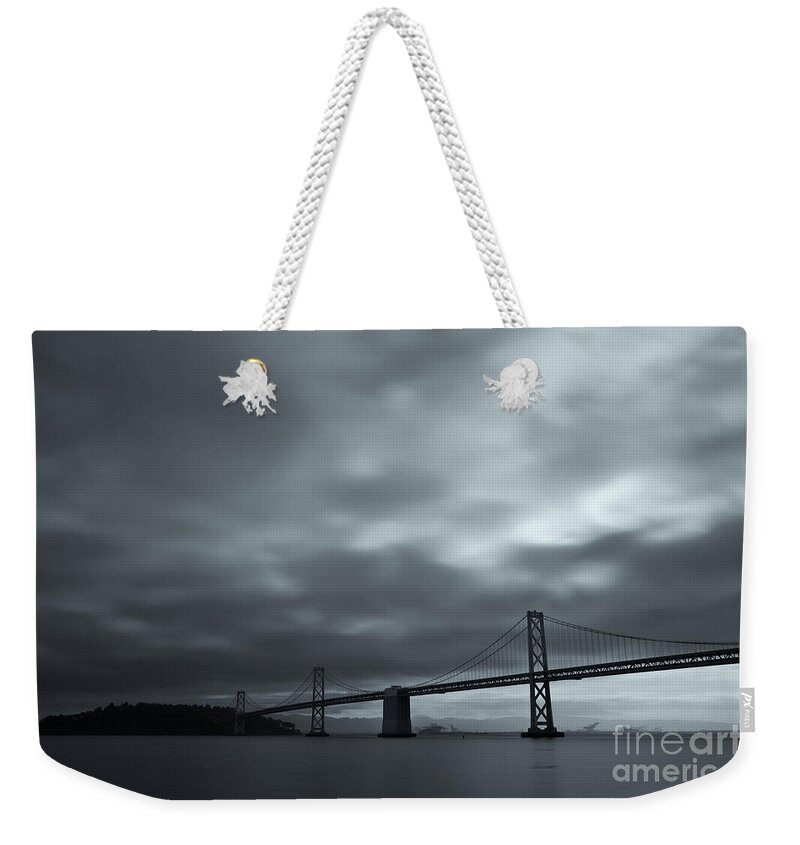 City Weekender Tote Bag featuring the photograph Chasing the Rain by Jonathan Nguyen