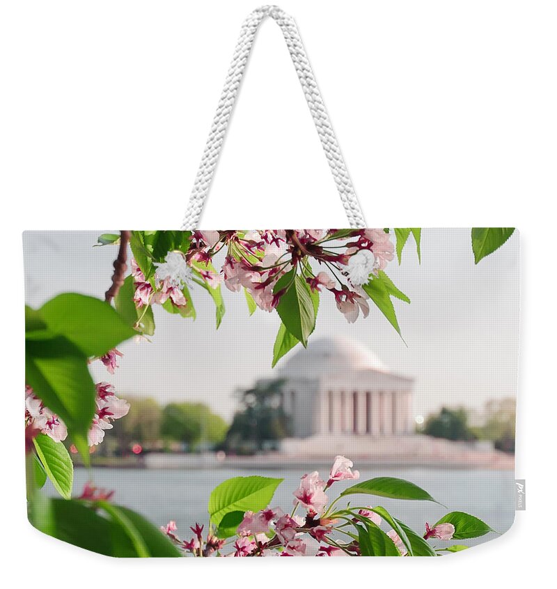America Weekender Tote Bag featuring the photograph Cherry Blossoms and the Jefferson Memorial by Mitchell R Grosky