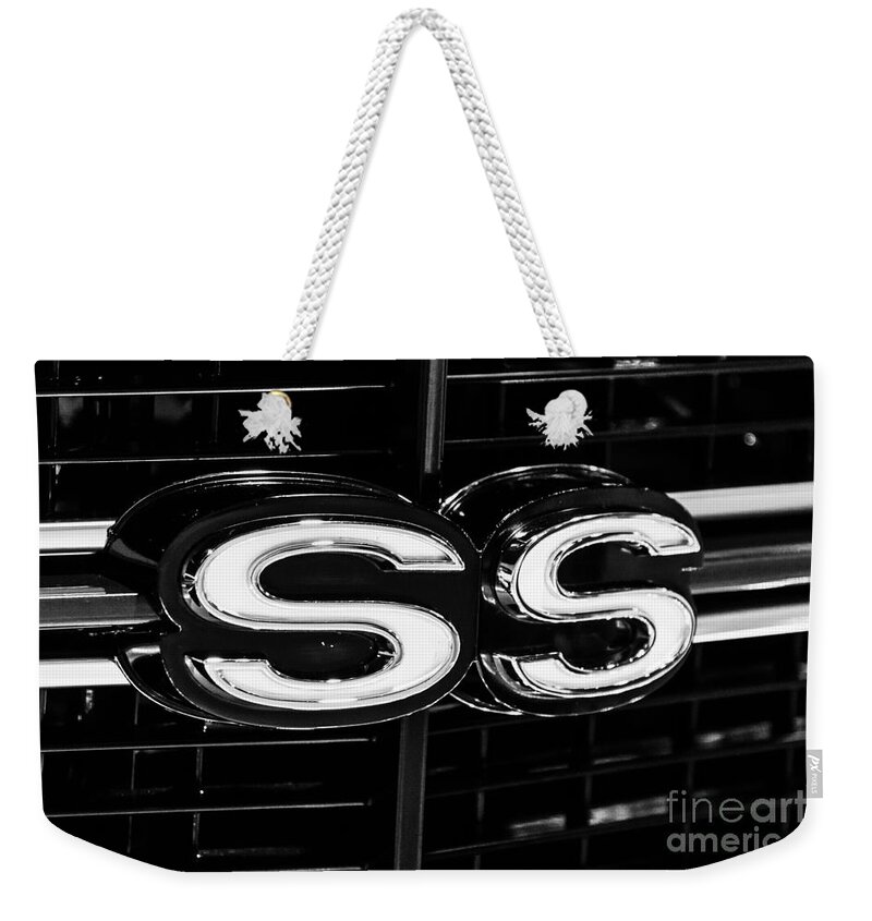 American Weekender Tote Bag featuring the photograph Chevelle SS Super Sport Emblem Black and White Picture by Paul Velgos