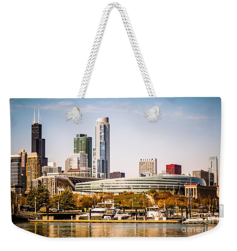 America Weekender Tote Bag featuring the photograph Chicago Skyline with Soldier Field by Paul Velgos