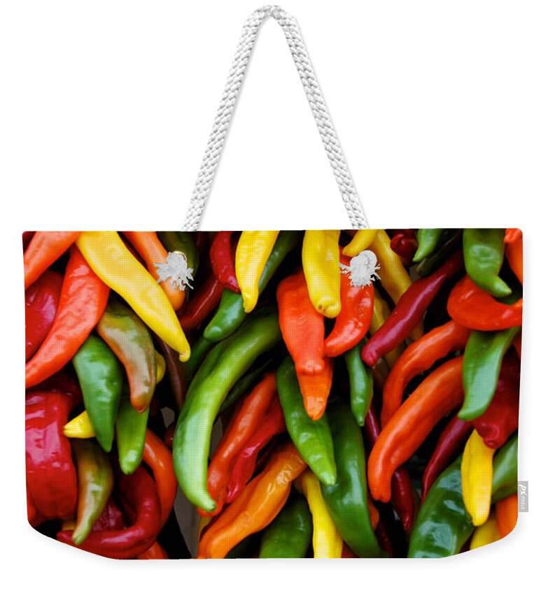 Chile Weekender Tote Bag featuring the photograph Chile Ristras by Mary Lee Dereske