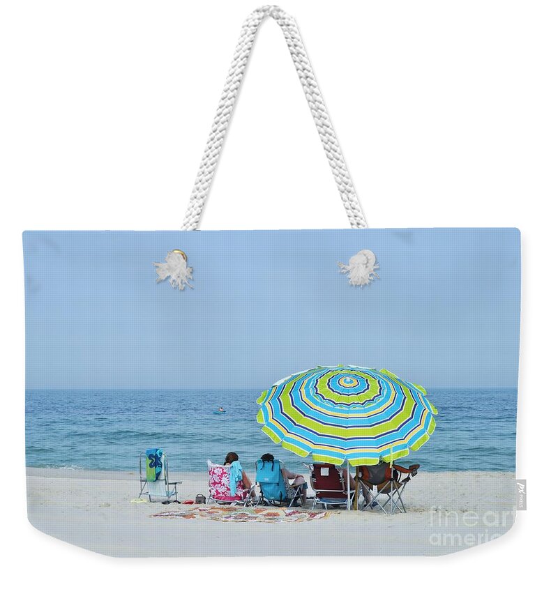 Chillin On The Beach Weekender Tote Bag featuring the photograph Chillin on the Beach by Allen Beatty