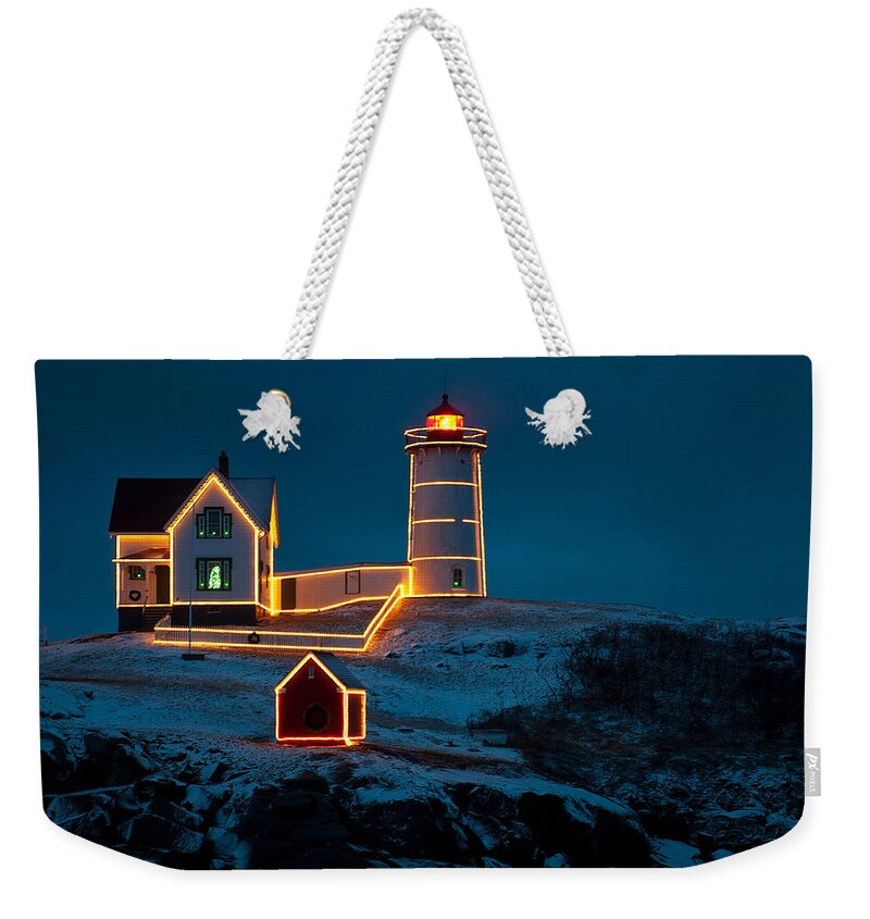 Light Weekender Tote Bag featuring the photograph Christmas at Nubble Light by Paul Mangold