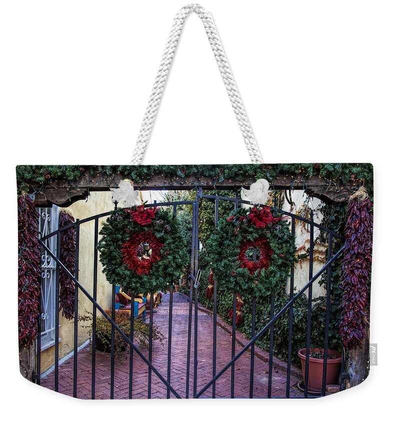 Old Town Albuquerque Weekender Tote Bag featuring the photograph Christmas Gate by Diana Powell