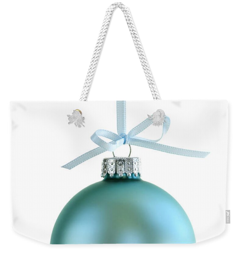 Christmas Weekender Tote Bag featuring the photograph Christmas ornament on white by Elena Elisseeva