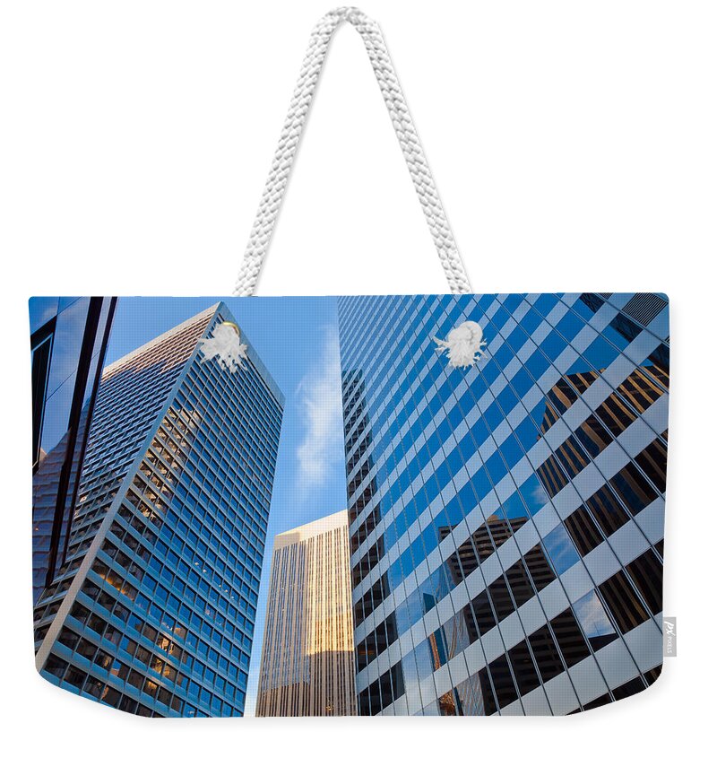 City Weekender Tote Bag featuring the photograph City In Reflections by Jonathan Nguyen