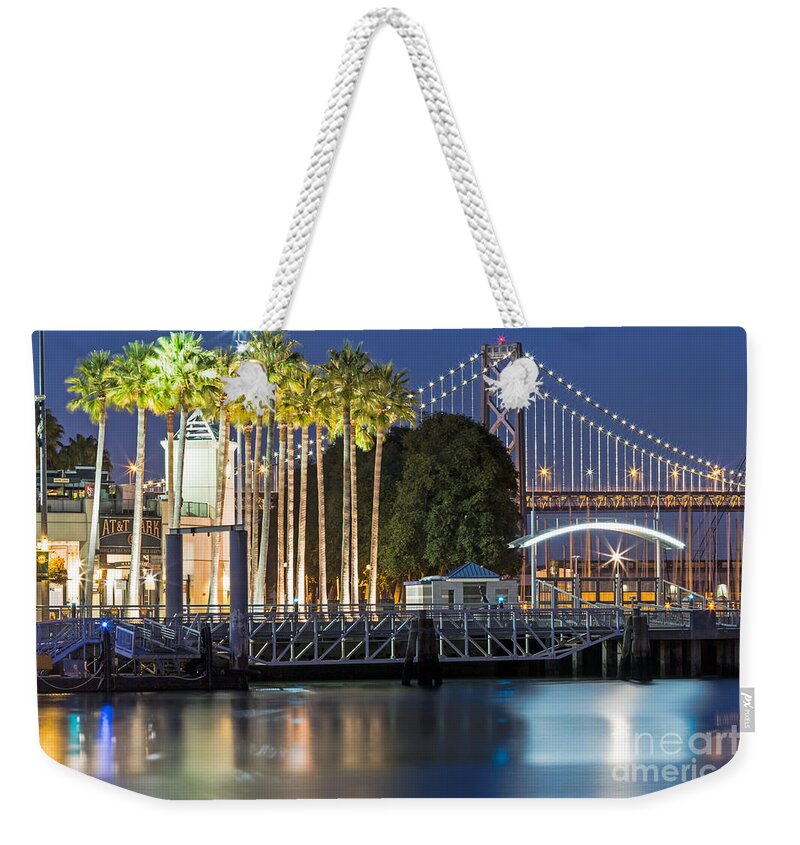At&t Park Weekender Tote Bag featuring the photograph City Lights on Mission Bay by Kate Brown