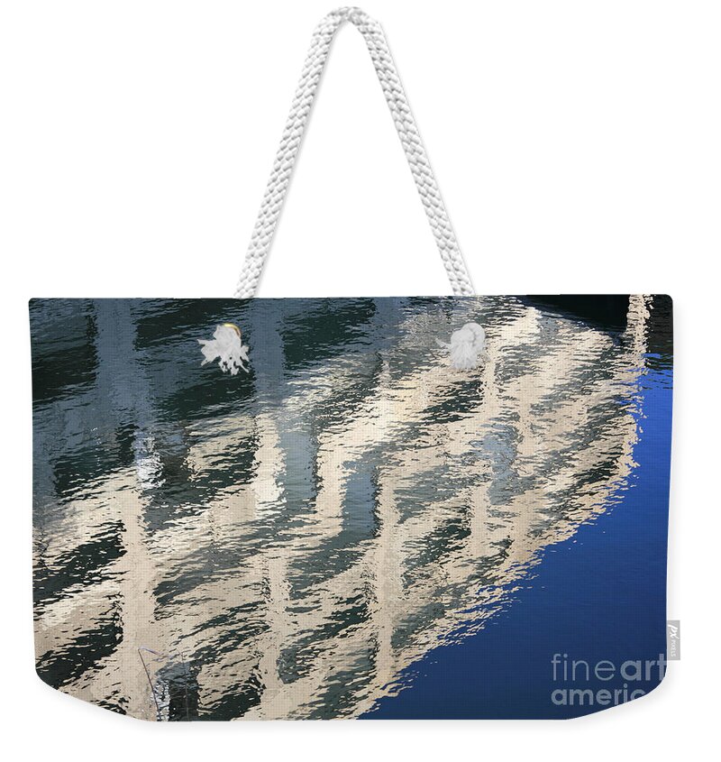 City Reflections Abstract Reflected Building Water Ripple Weekender Tote Bag featuring the photograph City Reflections by Julia Gavin