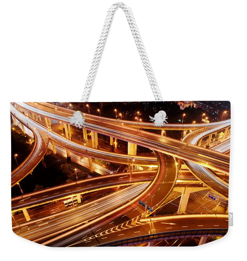 Land Vehicle Weekender Tote Bag featuring the photograph City Veins by Wei Fang