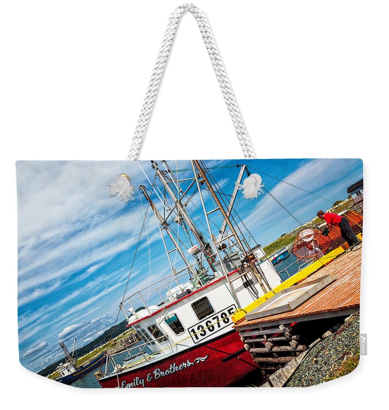 Canada Weekender Tote Bag featuring the photograph Cleaning the Boat by Perla Copernik