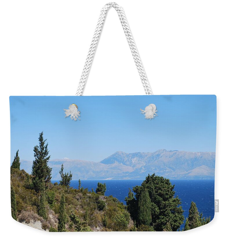 Clear Day Weekender Tote Bag featuring the photograph Clear day by George Katechis