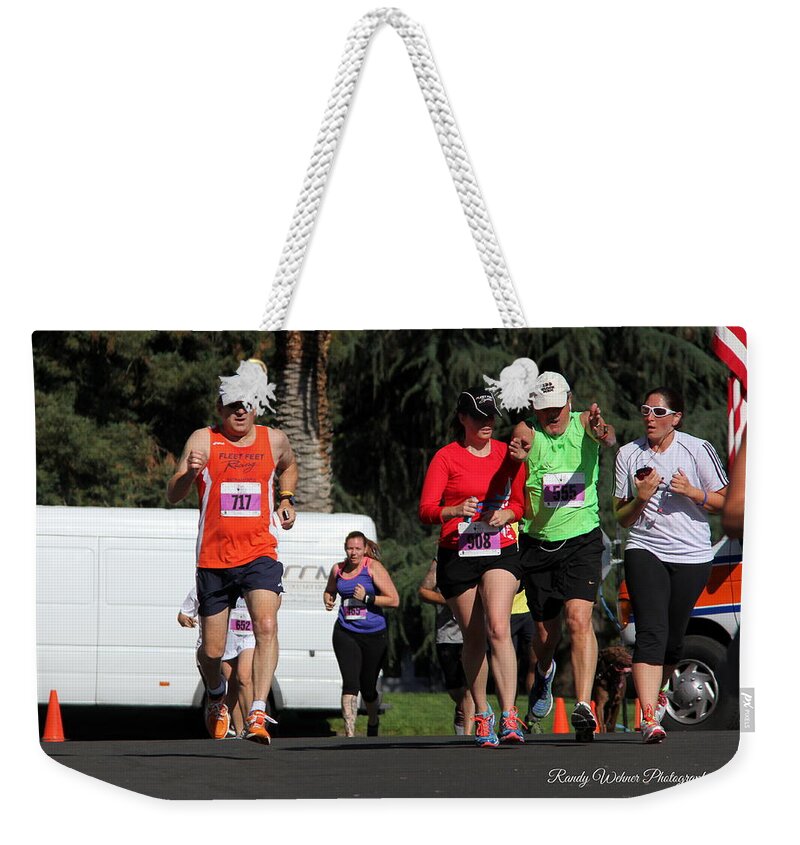 Alzheimer's 5k Run 2014 Weekender Tote Bag featuring the photograph Clearing the Path by Randy Wehner