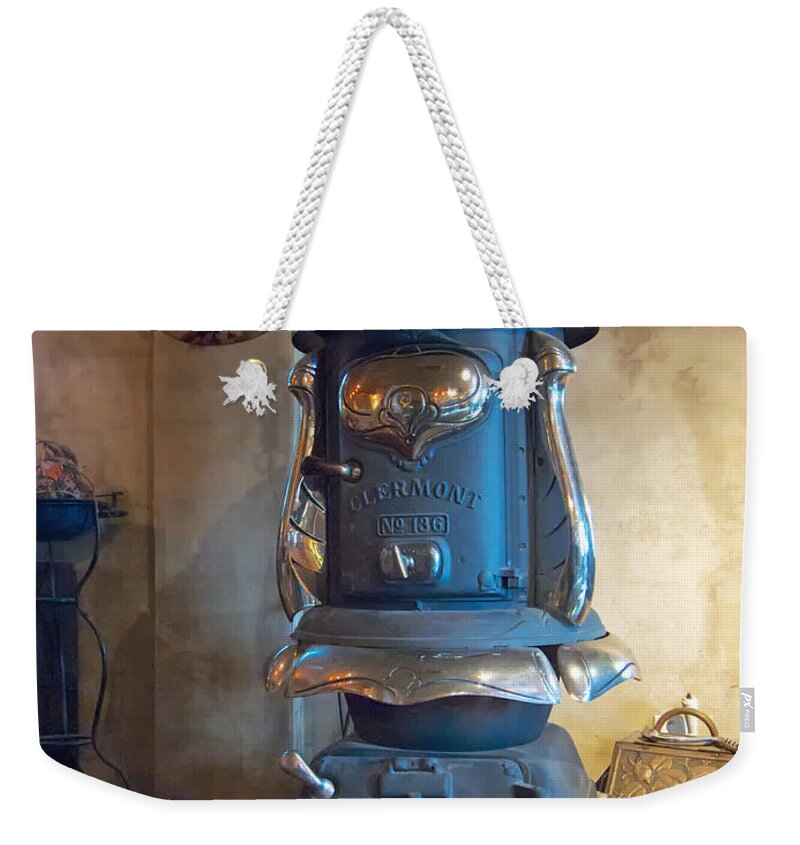 Pot-belly Weekender Tote Bag featuring the photograph Clermont No 136 Pot Belly Stove by Mary Lee Dereske