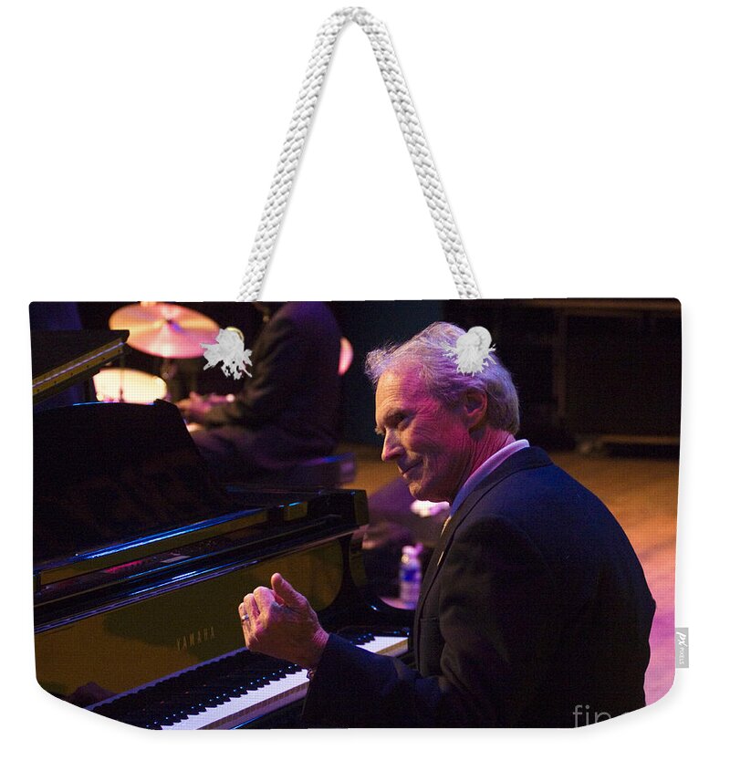 Craig Lovell Weekender Tote Bag featuring the photograph Clint Eastwood on Piano in Monterey by Craig Lovell