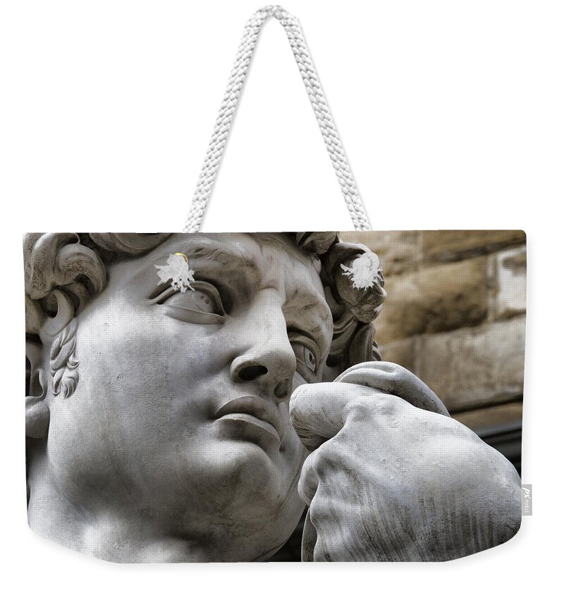 Close-up Weekender Tote Bag featuring the photograph Close-up face Statue of David in Florence by David Smith