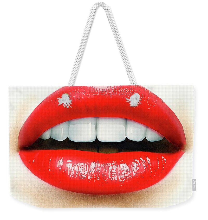Adult Weekender Tote Bag featuring the photograph Close Up Of Mouth, Teeth And Red Lips by Ikon Ikon Images