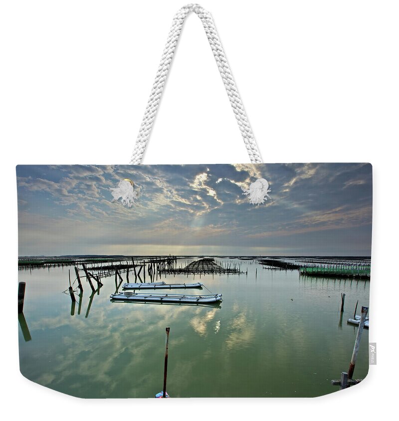 Scenics Weekender Tote Bag featuring the photograph Clouds Over Chigu Lagoon by Sunrise@dawn Photography