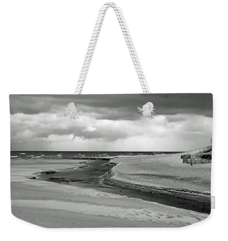 Beach Weekender Tote Bag featuring the photograph Cloudy Beach by Jackson Pearson
