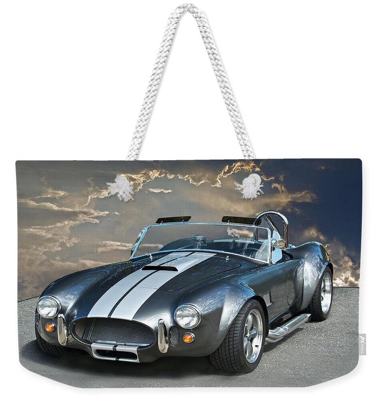 Auto Weekender Tote Bag featuring the photograph Cobra in the Clouds by Dave Koontz