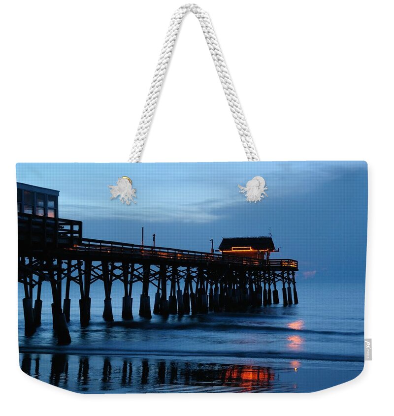 Pier Weekender Tote Bag featuring the photograph Cocoa Beach Pier at twilight by Bradford Martin