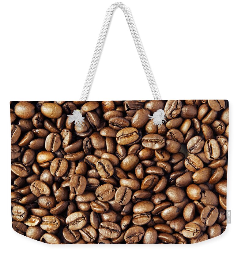 Bean Weekender Tote Bag featuring the photograph Coffee beans by Les Cunliffe