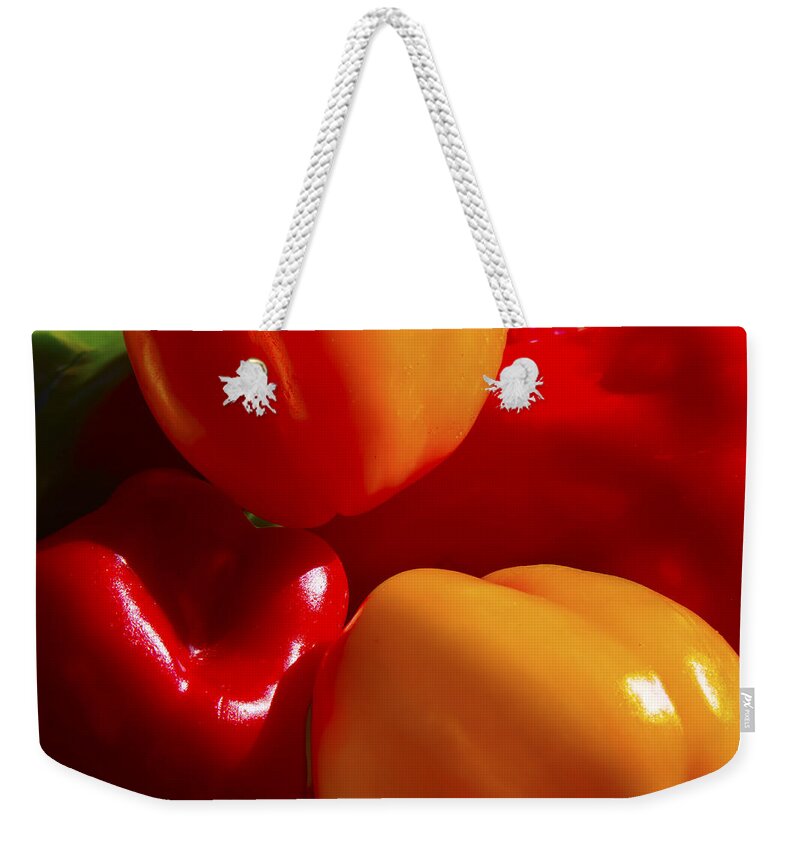 Yellow Weekender Tote Bag featuring the photograph Colorful Bells by Gary Holmes
