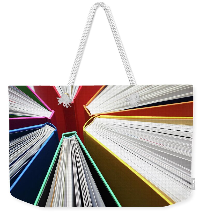 Expertise Weekender Tote Bag featuring the photograph Colorful Books Abstract by Blackred