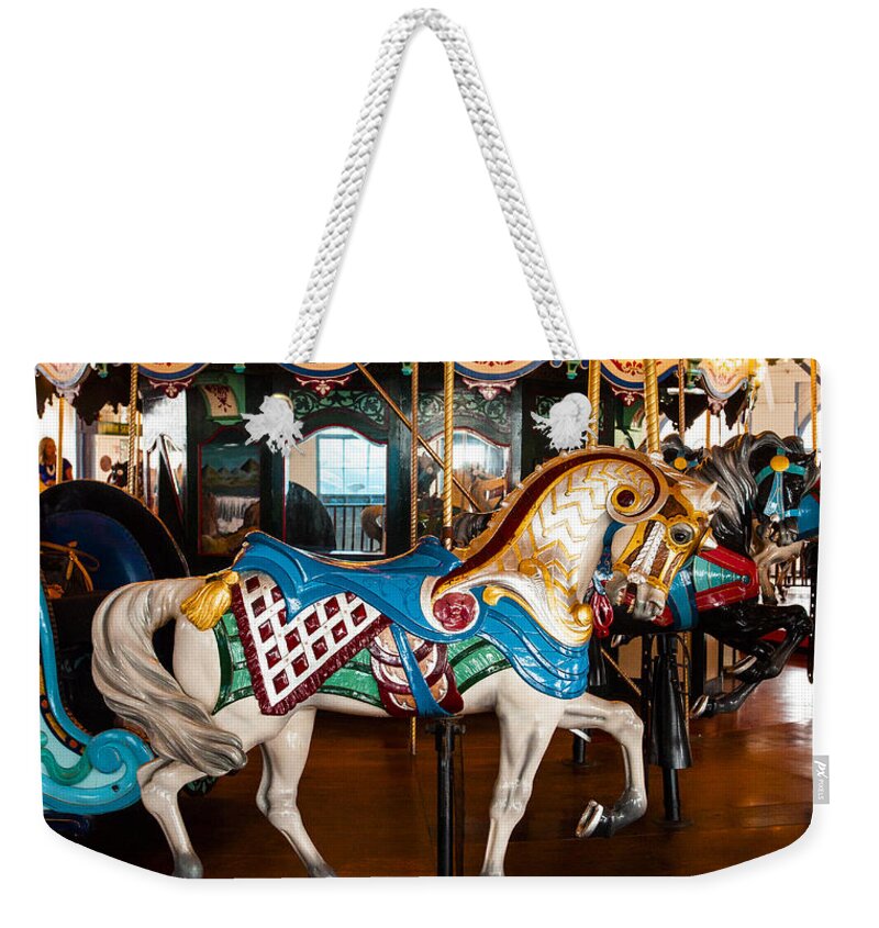 Carousel Horse Ride Weekender Tote Bag featuring the photograph Colorful Carousel Horse by Jerry Cowart