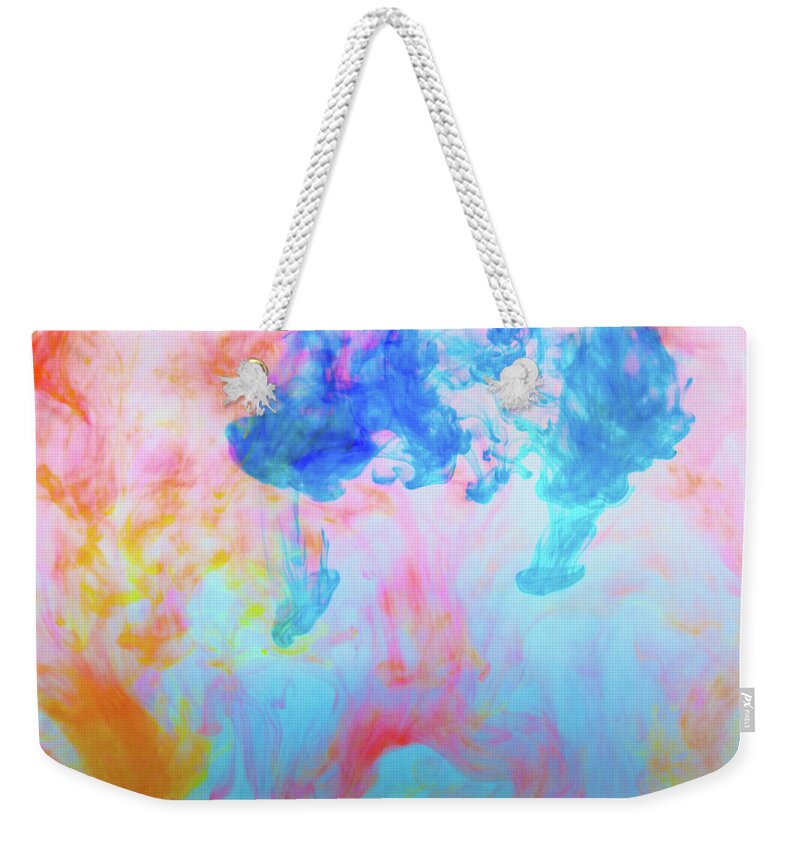 Art Weekender Tote Bag featuring the photograph Colorful Dyes In Water by Diane Macdonald
