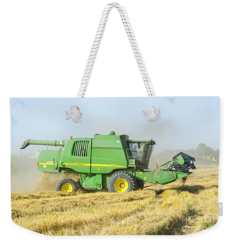 Combine Harvester Weekender Tote Bag featuring the photograph Combine harvester by PhotoStock-Israel