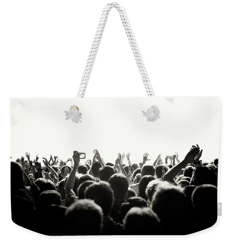 Rock Music Weekender Tote Bag featuring the photograph Concert Crowd by Alenpopov