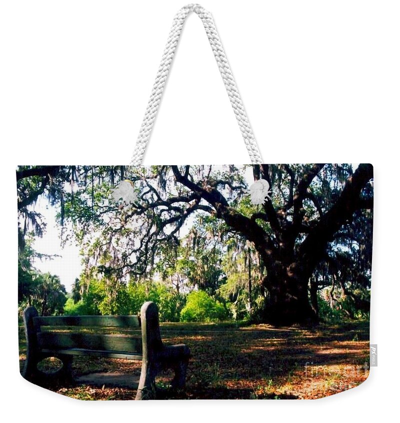Nola Weekender Tote Bag featuring the photograph New Orleans Contemplating Solitude by Michael Hoard