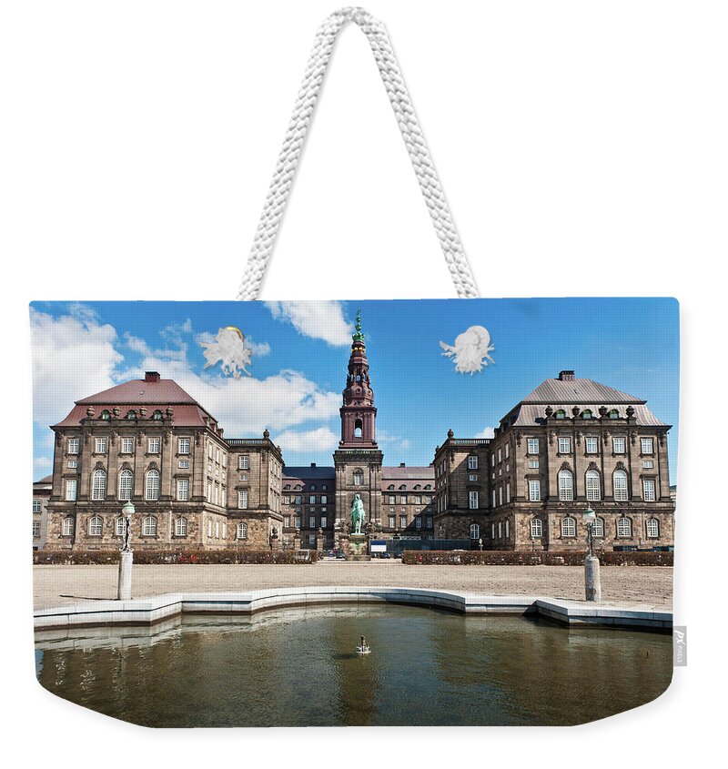 Clock Tower Weekender Tote Bag featuring the photograph Copenhagen Folketing Parliament by Fotovoyager