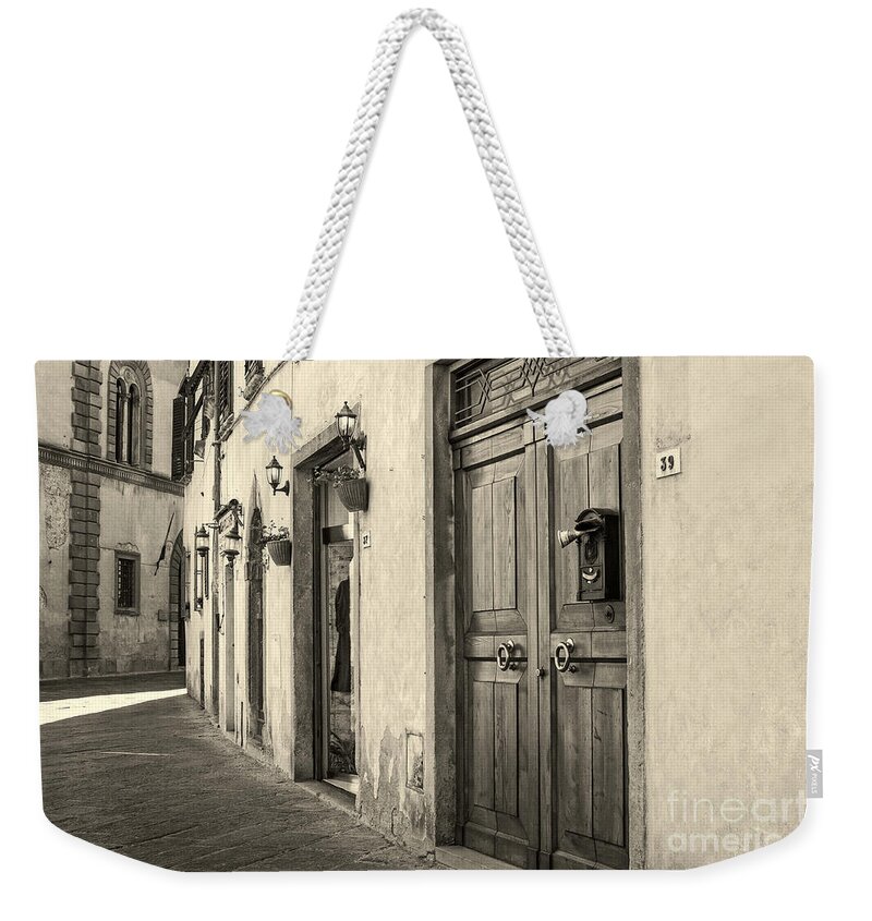Volterra Weekender Tote Bag featuring the photograph Corner of Volterra by Prints of Italy