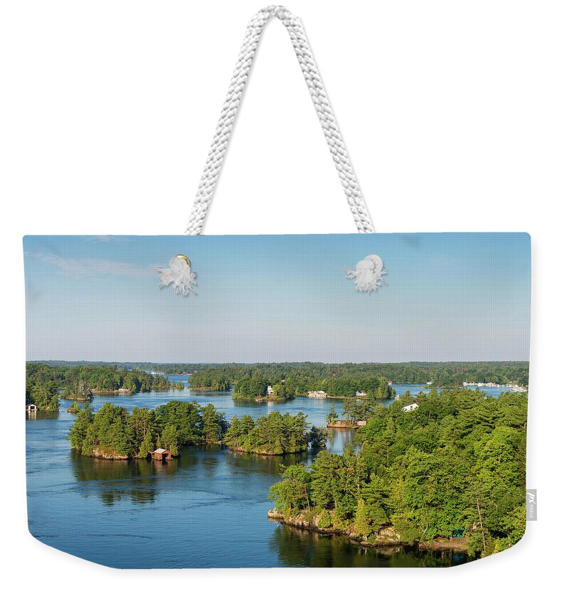 Photography Weekender Tote Bag featuring the photograph Cottages In Thousand Islands Region by Panoramic Images