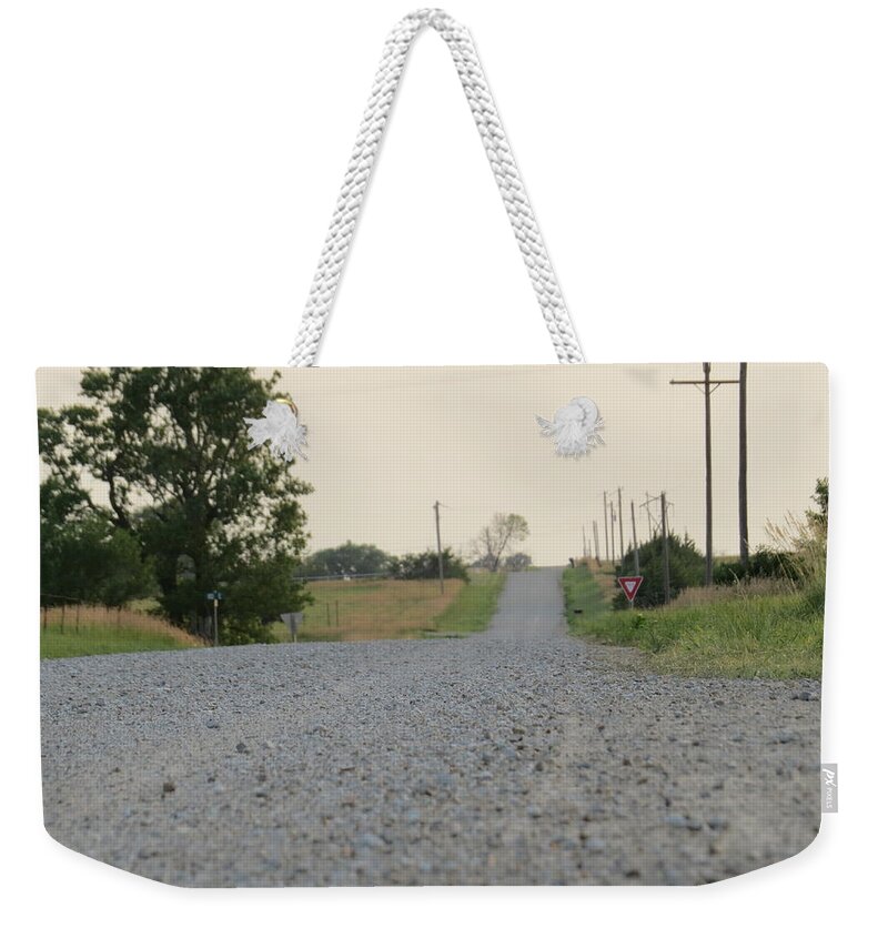 Country Weekender Tote Bag featuring the photograph Country road at twlight by Aaron Martens