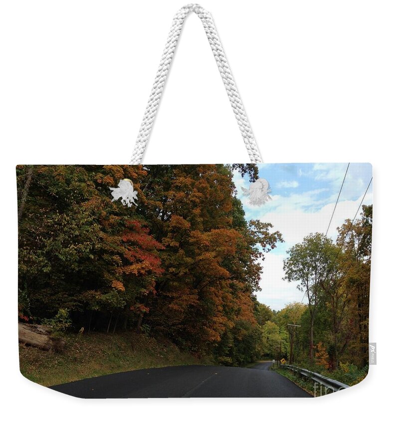 New York Weekender Tote Bag featuring the photograph Country Road in Autumn by Cornelia DeDona