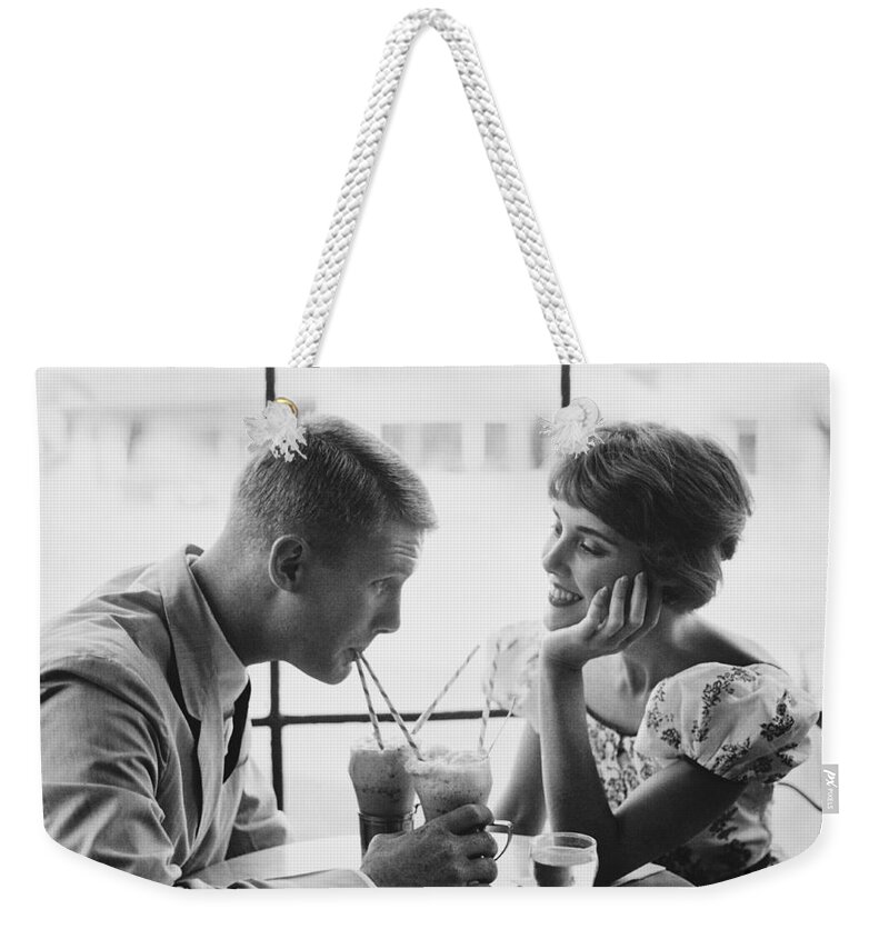 Couple Weekender Tote Bag featuring the photograph Couple Enjoying Sodas 1950 by Tom Tucker