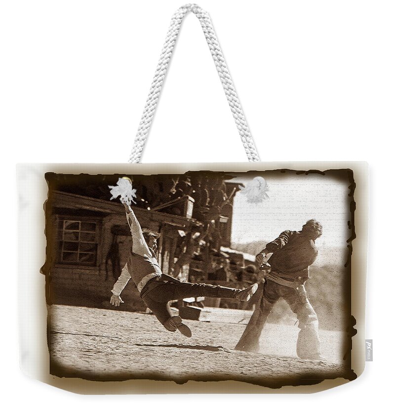 Justjeffaz Weekender Tote Bag featuring the photograph Cowboy Gunfight 3 by JustJeffAz Photography