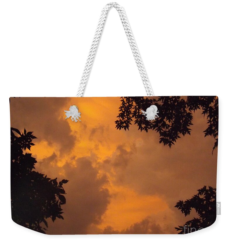 Cloud Weekender Tote Bag featuring the photograph Cresting the Storm Clouds by Brenda Brown