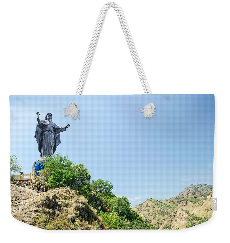 Cristo Weekender Tote Bag featuring the photograph Cristo Rei Statue Near Dili East Timor Timor Leste by JM Travel Photography