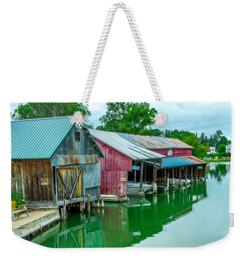 Crooked River Weekender Tote Bag featuring the photograph Crooked River Marina by Bill Gallagher