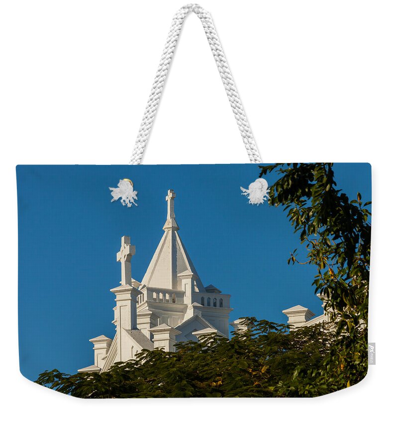 1919 Weekender Tote Bag featuring the photograph Crosses Above the Trees by Ed Gleichman